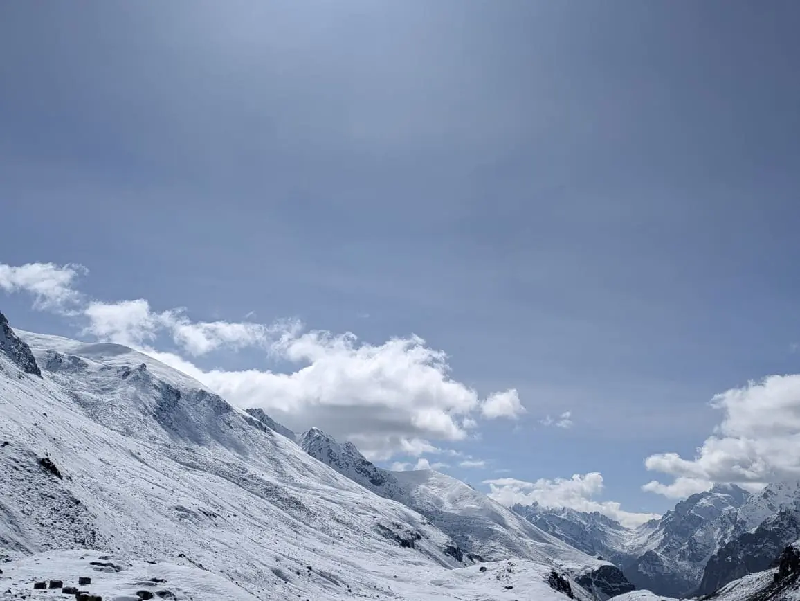 A snowfield under high cloud